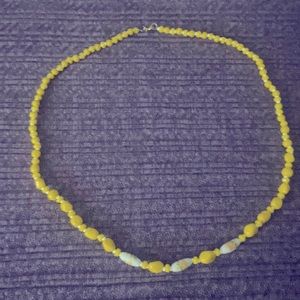 Yellow and white glass beads necklace the white beads have yellow roses on them